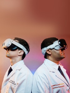 Doctors gaze up into virtual reality headsets.