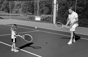 Mati Luik playing tennis with Carolina Luik.